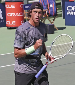 Alexander Lebedev playing tennis